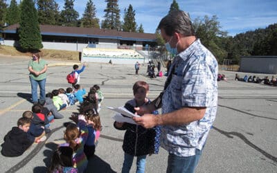 Students drop and cover during Shake Out