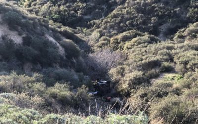 Woman rescued after Hwy 18 plunge