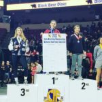 2022 state wrestling championship winners on podium