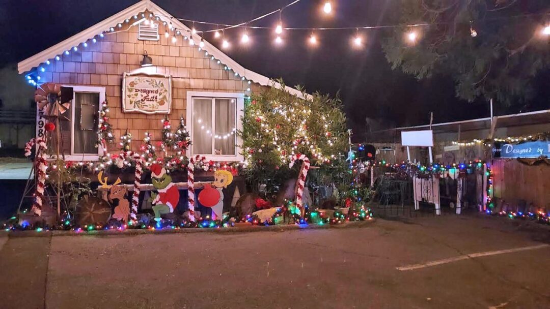 Festive house with Christmas lights and decorations.