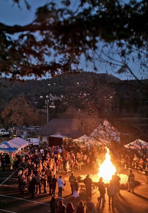 Adrianne, Lisa, Julia, Melissa and Adrianna from Glendora and Orange County enjoyed last year’s Brewfest at Tavern Bay Beach Club so much they couldn’t resist attending this year’s event. (Photos by Douglas W. Motley) Outdoor night festival with large bonfire and tents.