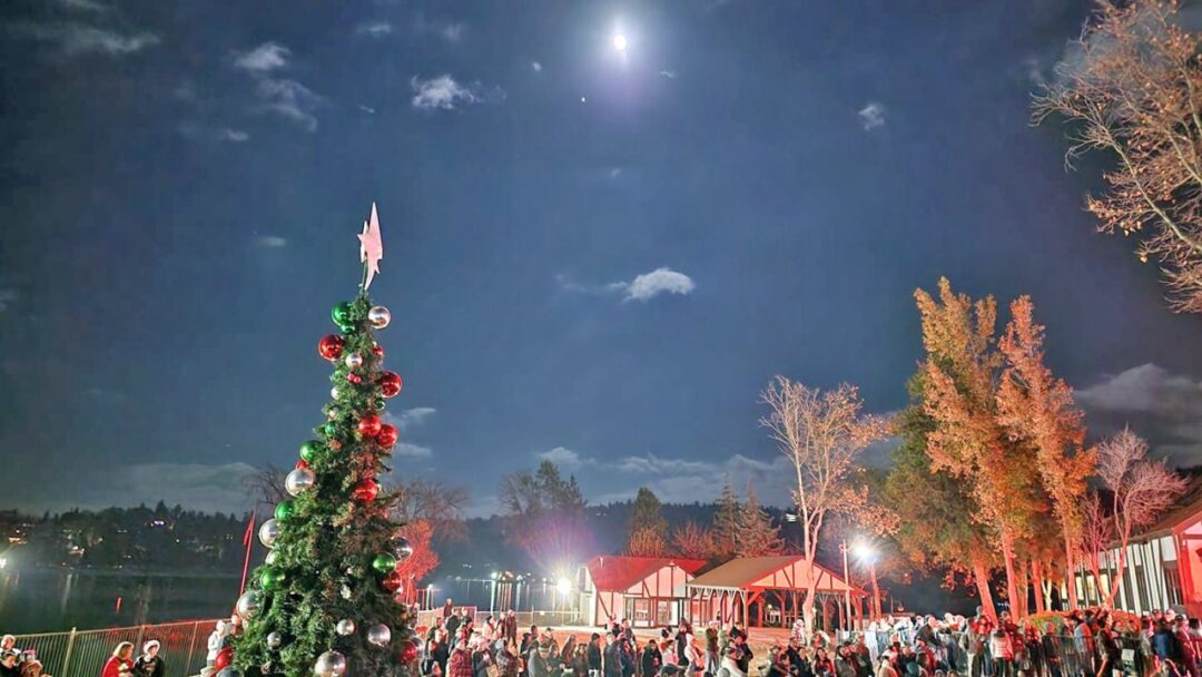 Adrianne, Lisa, Julia, Melissa and Adrianna from Glendora and Orange County enjoyed last year’s Brewfest at Tavern Bay Beach Club so much they couldn’t resist attending this year’s event. (Photos by Douglas W. Motley) Christmas tree and crowd under moonlit night sky.