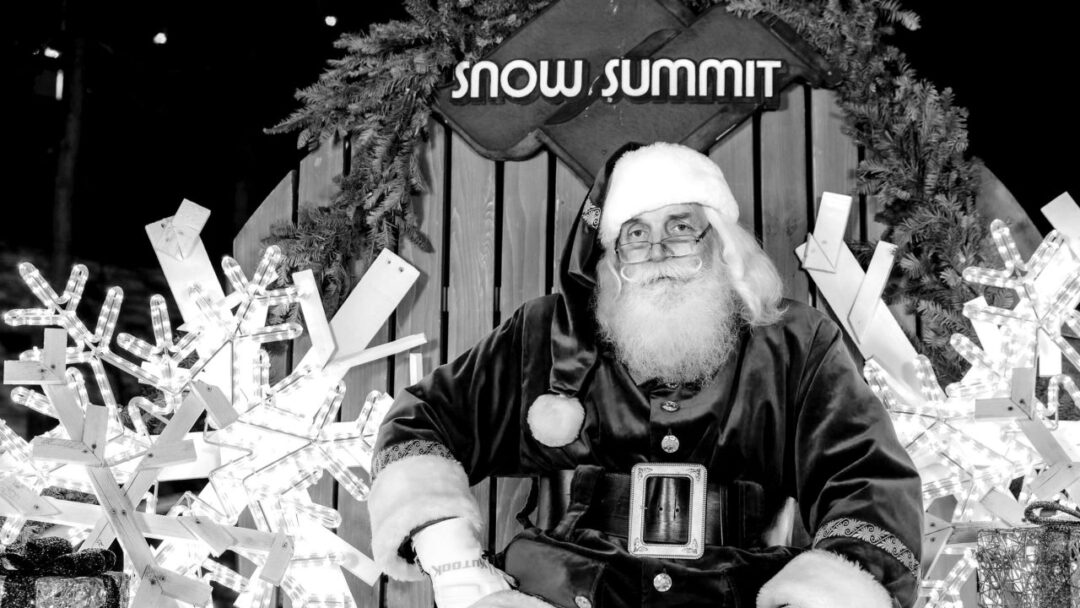 Santa Claus at Snow Summit with decorations.