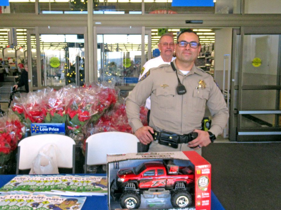 Adrianne, Lisa, Julia, Melissa and Adrianna from Glendora and Orange County enjoyed last year’s Brewfest at Tavern Bay Beach Club so much they couldn’t resist attending this year’s event. (Photos by Douglas W. Motley) Police officer at toy donation event in store