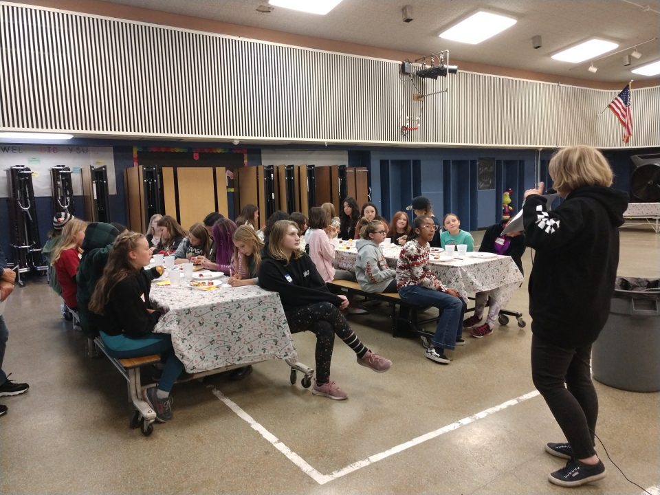 Elaine Tipton went over the code of conduct for Every Girl Counts with the middle-school girls.