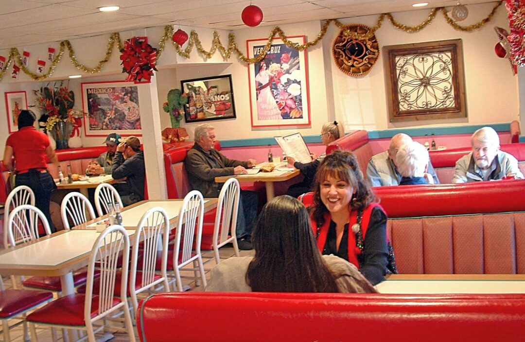 The restaurant’s interior is colorful and cozy. It’s meant to feel like home. Because El Toto’s is open every day, it’s the “home away from home” for owners Raudel and Mercedes. (Photo by T. Wilcox)