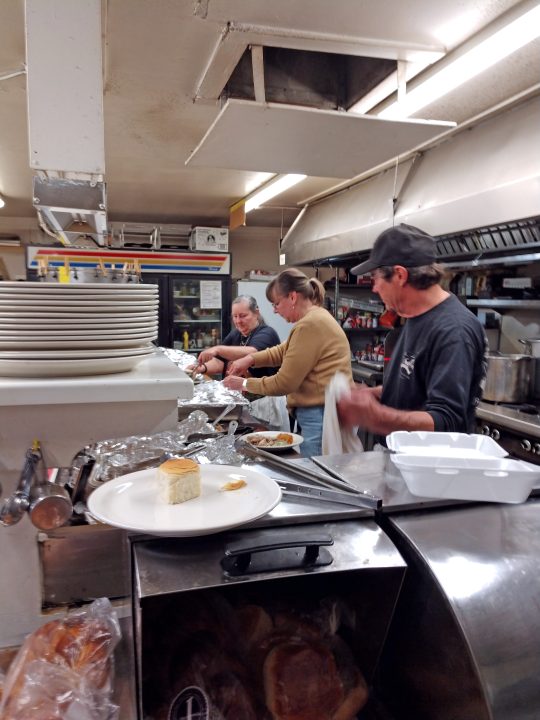 Adrianne, Lisa, Julia, Melissa and Adrianna from Glendora and Orange County enjoyed last year’s Brewfest at Tavern Bay Beach Club so much they couldn’t resist attending this year’s event. (Photos by Douglas W. Motley) Chefs preparing meals in a restaurant kitchen.
