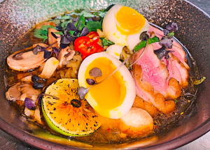 Duck-breast ramen, a Japanese noodle dish, epitomizes the restaurant’s emphasis on and reputation for eye-catching presentation. (Photo courtesy of The Grill at Antlers Inn)