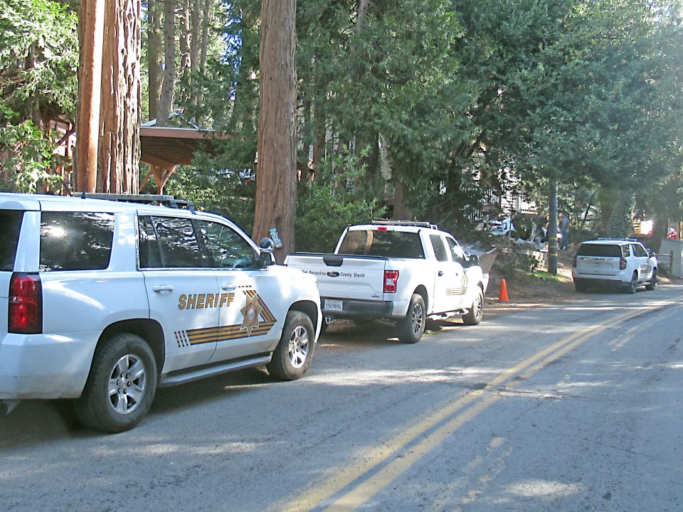 Adrianne, Lisa, Julia, Melissa and Adrianna from Glendora and Orange County enjoyed last year’s Brewfest at Tavern Bay Beach Club so much they couldn’t resist attending this year’s event. (Photos by Douglas W. Motley) Sheriff vehicles parked on forest road