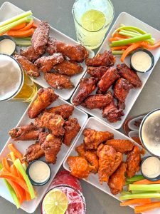 Varied bone-in-wing options can serve as an appetizer or a main-course selection. (Photo courtesy of Jetties Waterfront Kitchen + Drink)