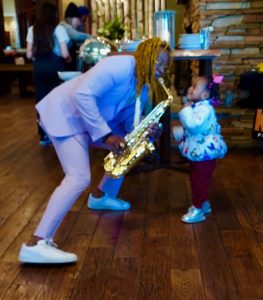 King P serenades his daughter