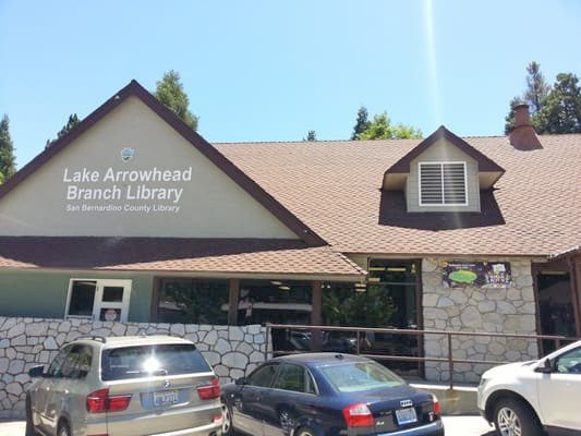 Adrianne, Lisa, Julia, Melissa and Adrianna from Glendora and Orange County enjoyed last year’s Brewfest at Tavern Bay Beach Club so much they couldn’t resist attending this year’s event. (Photos by Douglas W. Motley) Lake Arrowhead Branch Library exterior with cars parked.