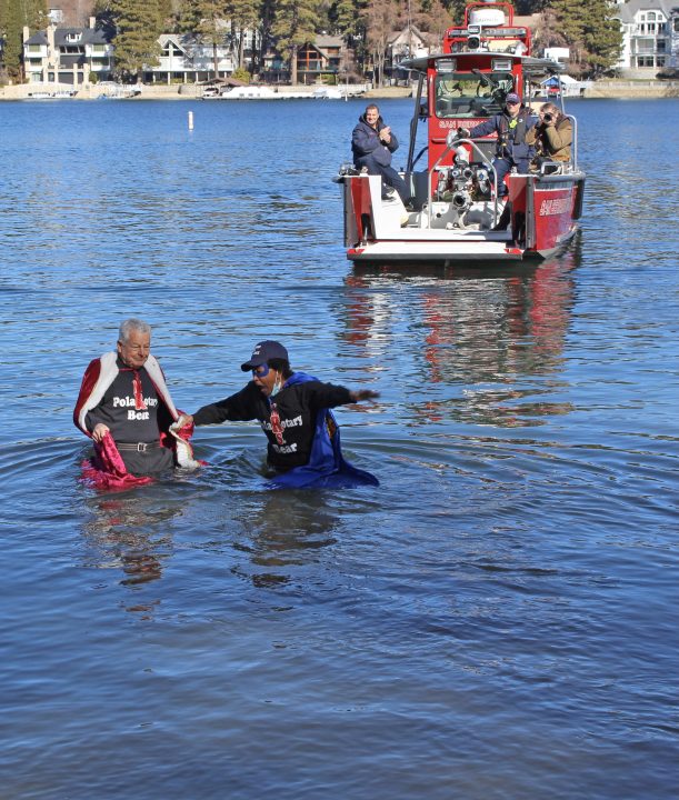 Adrianne, Lisa, Julia, Melissa and Adrianna from Glendora and Orange County enjoyed last year’s Brewfest at Tavern Bay Beach Club so much they couldn’t resist attending this year’s event. (Photos by Douglas W. Motley) People participating in a polar bear plunge event.