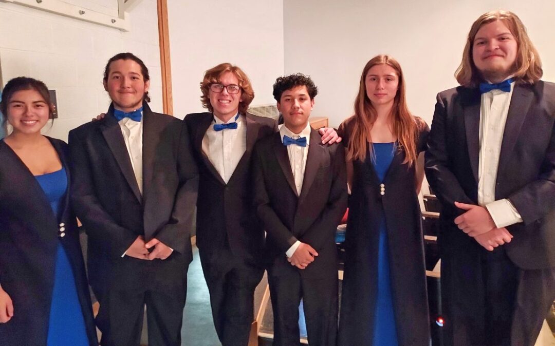 Evangeline, tenor sax; Julian, alto sax; Dylan, percussion; Isaiah, trumpet; Ava, flute; and Carter, tuba (left to right).