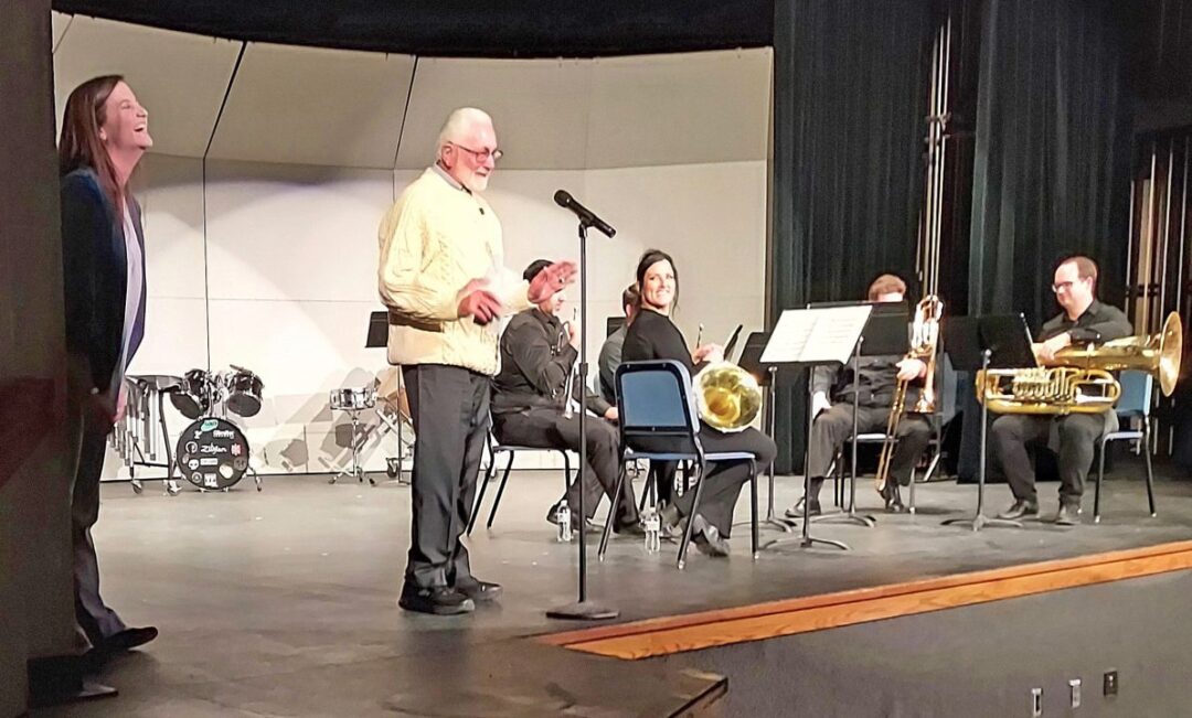 Kari Stebbing and Ken Camarella share a laugh with the quintet