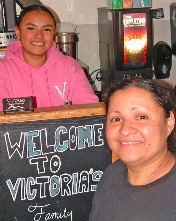 Adrianne, Lisa, Julia, Melissa and Adrianna from Glendora and Orange County enjoyed last year’s Brewfest at Tavern Bay Beach Club so much they couldn’t resist attending this year’s event. (Photos by Douglas W. Motley) Smiling women at Victoria's café welcome sign.