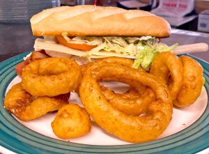 Pleasantly plump onion rings are the perfect complement to the popular California turkey sub. (Photo courtesy of Victoria’s Family Restaurant)