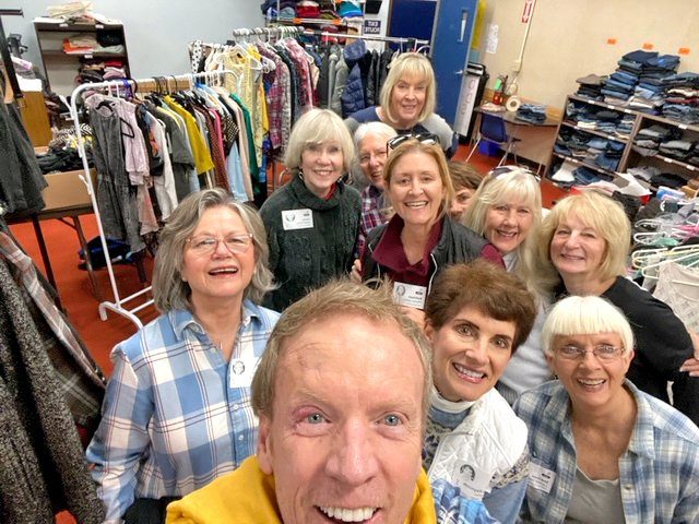 Adrianne, Lisa, Julia, Melissa and Adrianna from Glendora and Orange County enjoyed last year’s Brewfest at Tavern Bay Beach Club so much they couldn’t resist attending this year’s event. (Photos by Douglas W. Motley) Group smiling at thrift store with clothes racks.