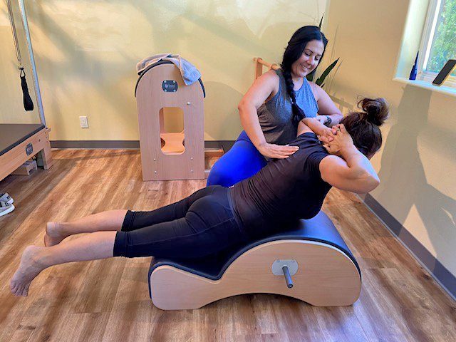 Adrianne, Lisa, Julia, Melissa and Adrianna from Glendora and Orange County enjoyed last year’s Brewfest at Tavern Bay Beach Club so much they couldn’t resist attending this year’s event. (Photos by Douglas W. Motley) Woman doing Pilates exercise with instructor guidance.