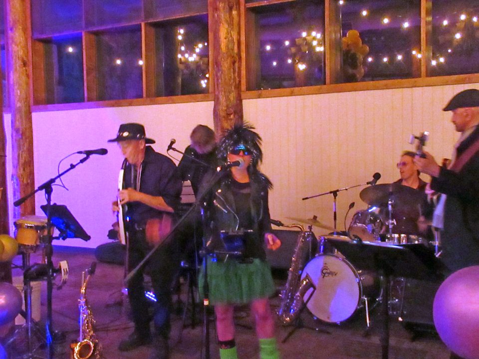 Adrianne, Lisa, Julia, Melissa and Adrianna from Glendora and Orange County enjoyed last year’s Brewfest at Tavern Bay Beach Club so much they couldn’t resist attending this year’s event. (Photos by Douglas W. Motley) Live band performing at a festive indoor event.