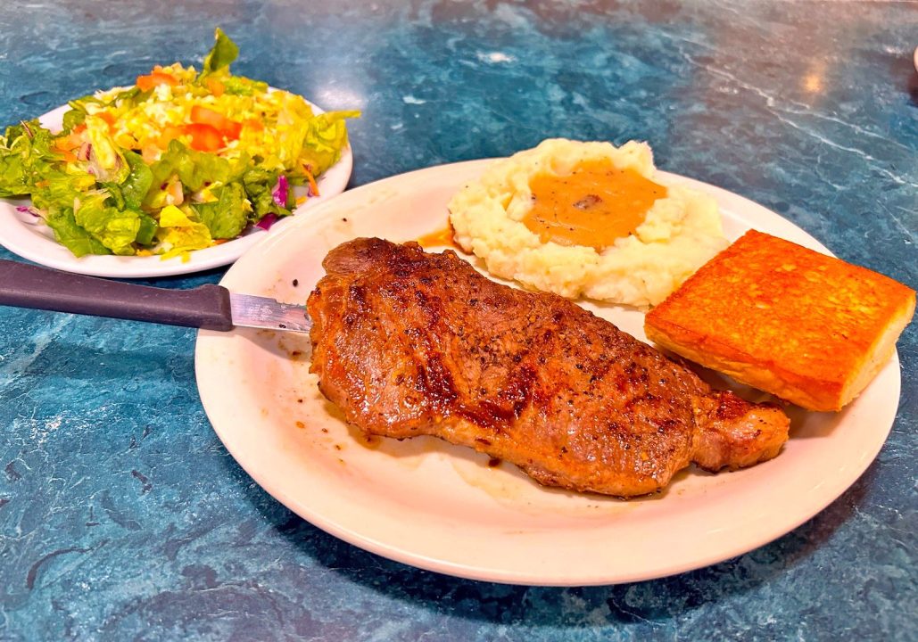 One of the best bets on Old Country’s dinner slate is New York strip steak with mashed potatoes, garlic bread and side salad.