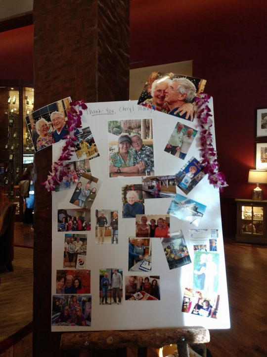 Guests were invited to add photos of Cheryl Moxley Harrison to this poster and write notes commemorating her. ((Photos by Mary-Justine Lanyon)