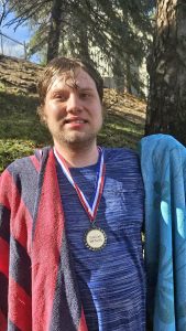 Ben Reeves sporting the medal he was awarded after jumping to benefit the Rim of the World Special Athletes. (Photo by Jack Cooperman)