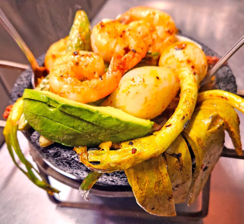 The restaurant’s signature offering is multi-ingredient molcajete. Says Jose: “It’s the most popular dish, especially with our regular customers.” (Photo courtesy of Rosalva’s Skyforest)