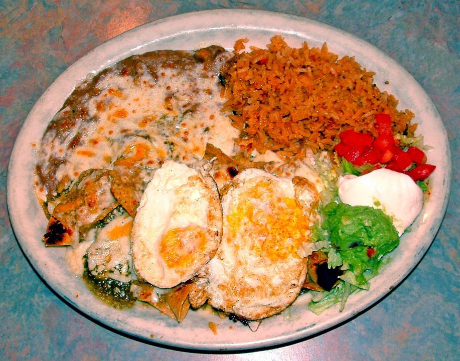 Hefty portions are the rule at Rosalva’s, as exemplified by chilaquiles with eggs and sides. (Photo by T. Wilcox