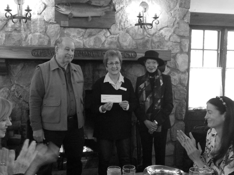 Adrianne, Lisa, Julia, Melissa and Adrianna from Glendora and Orange County enjoyed last year’s Brewfest at Tavern Bay Beach Club so much they couldn’t resist attending this year’s event. (Photos by Douglas W. Motley) People standing, holding a check, in rustic room.