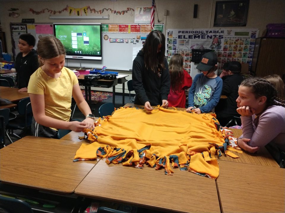 Adrianne, Lisa, Julia, Melissa and Adrianna from Glendora and Orange County enjoyed last year’s Brewfest at Tavern Bay Beach Club so much they couldn’t resist attending this year’s event. (Photos by Douglas W. Motley) Children crafting a colorful blanket in classroom.