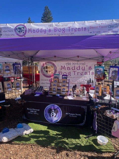 Adrianne, Lisa, Julia, Melissa and Adrianna from Glendora and Orange County enjoyed last year’s Brewfest at Tavern Bay Beach Club so much they couldn’t resist attending this year’s event. (Photos by Douglas W. Motley) Maddy's Dog Treats booth at outdoor market.