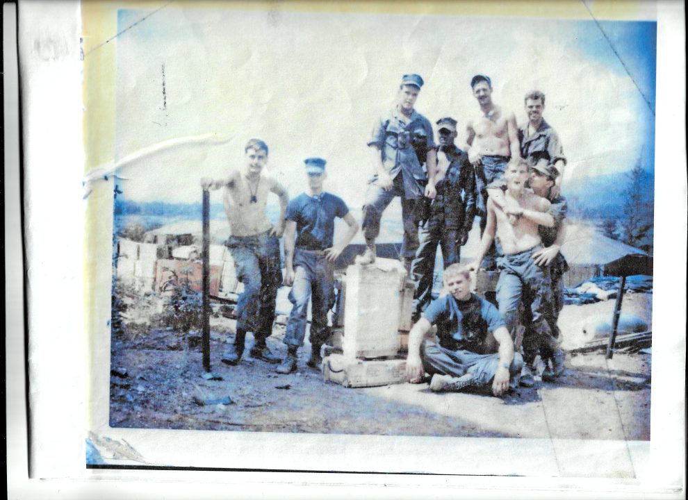 Group of soldiers posing outdoors