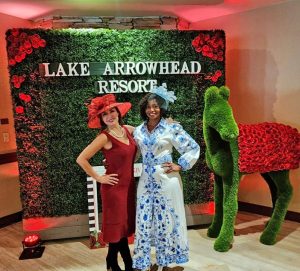 Cecilia Ponce de Leon (left) and Madrine Wright were among the ladies wearing lovely hats at the Derby party at the Resort.
