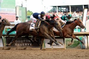 Mystik Dan (rail) reaches the wire before Sierra Leone (outside) and Forever Young (middle). (Photo: Rickelle Nelson/Horsephotos.com)
