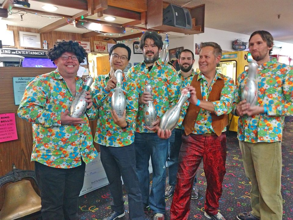 Adrianne, Lisa, Julia, Melissa and Adrianna from Glendora and Orange County enjoyed last year’s Brewfest at Tavern Bay Beach Club so much they couldn’t resist attending this year’s event. (Photos by Douglas W. Motley) Group of men holding bowling pins, colorful shirts