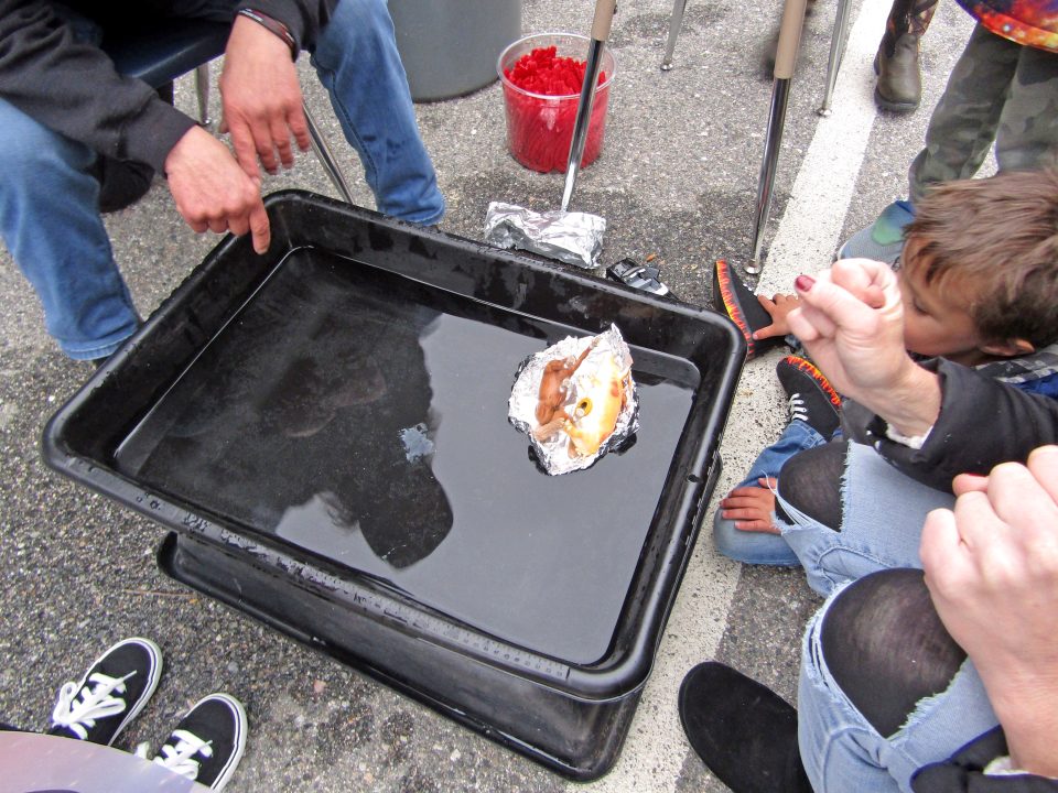 In this law of viscosity experiment, a flat-bottomed boat floated, whereas an aluminum foil canoe tipped over.