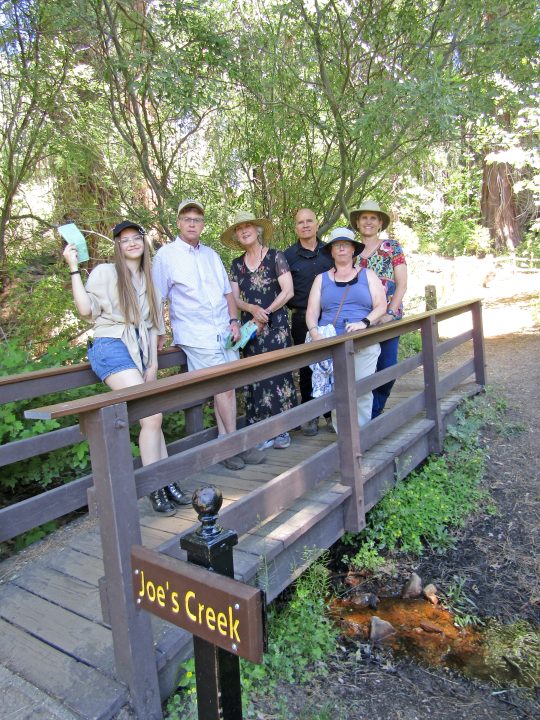 Members of the Henck family at the Joe’s Creek bridge at the Arboretum. (Photo by Rhea-Frances Tetley)