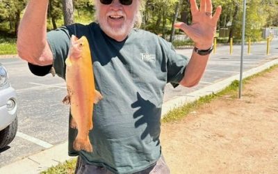 New resident fascinated by his catch