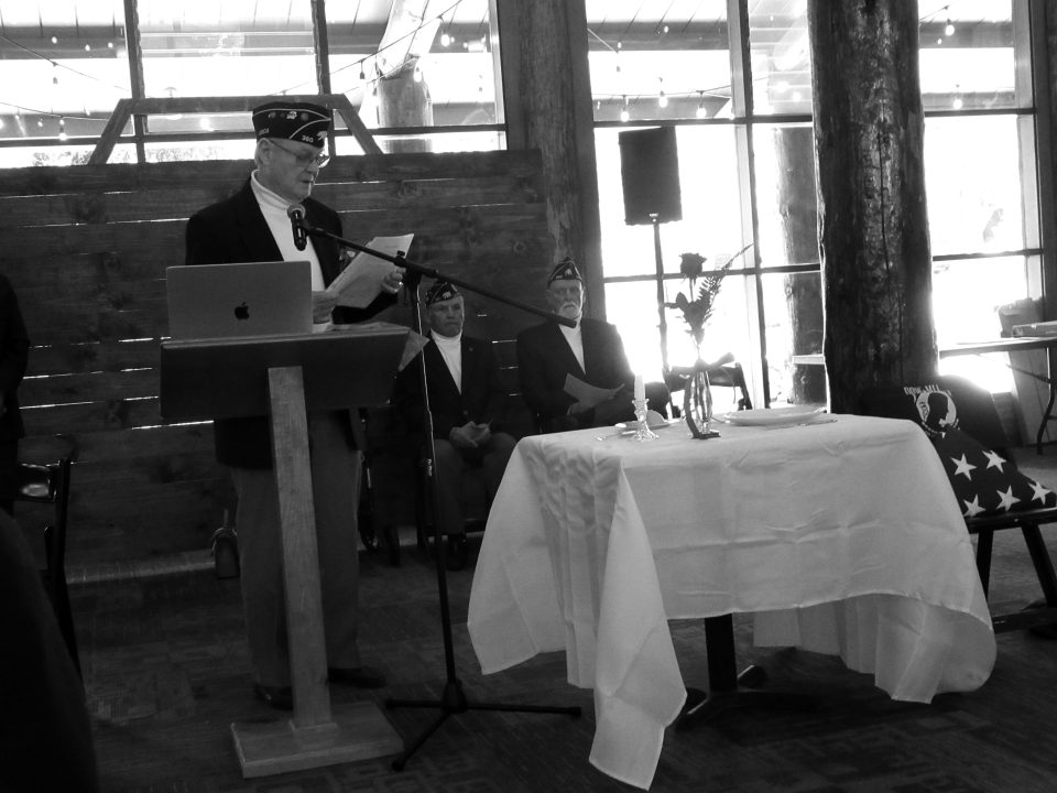Earl Eide explained the meaning behind each item on the POW/MIA table.