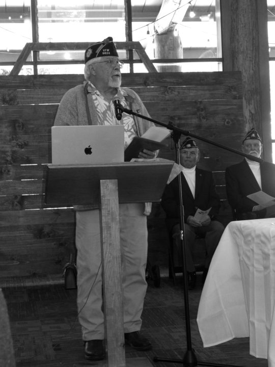 Joe Aquino, commander of VFW Post 9624, ended his speech with a poem he wrote as he headed home from serving in Vietnam.