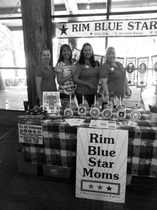 The Blue Star Moms – who put up banners honoring those serving and those who have given all – had a table at the Memorial Day observance.