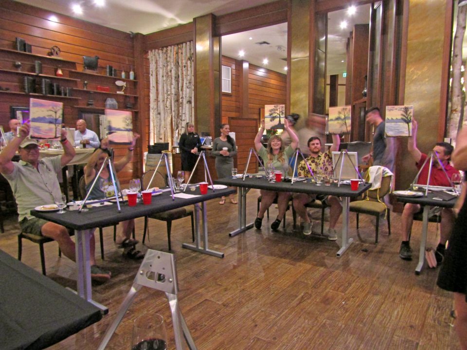Adrianne, Lisa, Julia, Melissa and Adrianna from Glendora and Orange County enjoyed last year’s Brewfest at Tavern Bay Beach Club so much they couldn’t resist attending this year’s event. (Photos by Douglas W. Motley) Group showing paintings in art class setting.