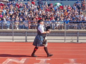 Piper Holly Fischer led the way for the Rim High staff and Class of 2024 to make their way onto the football field. (Photos by Mary-Justine Lanyon)