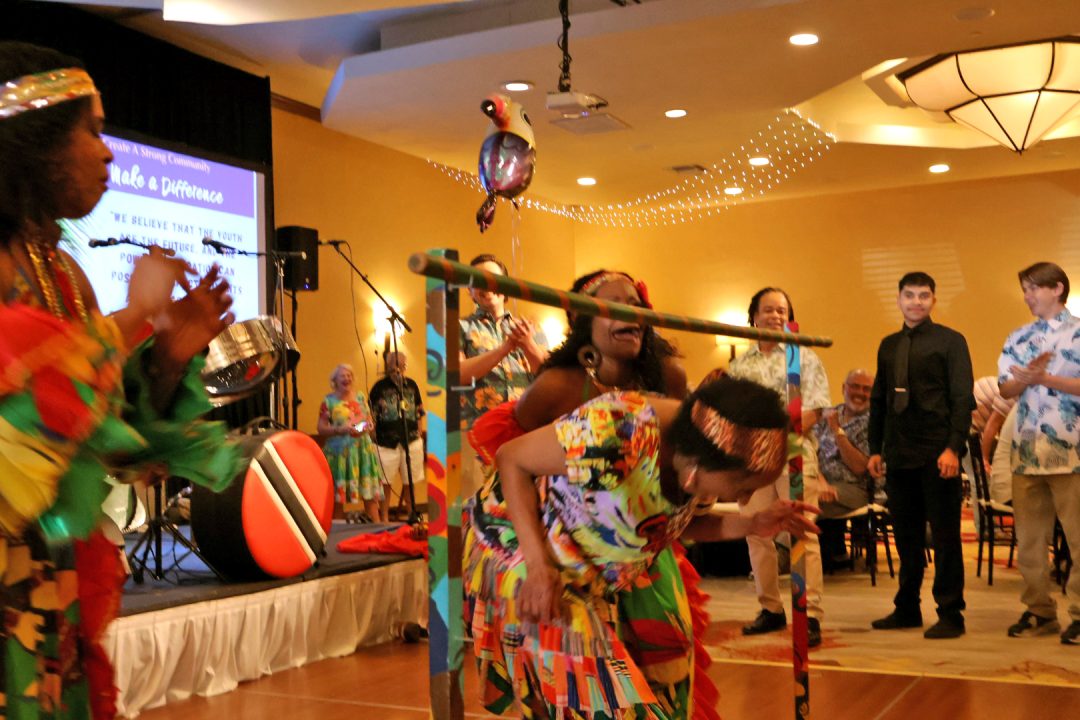 Rim Ed President Jo Bonita Rains had her own way of conquering limbo. (Photo by Brooke Woolley)