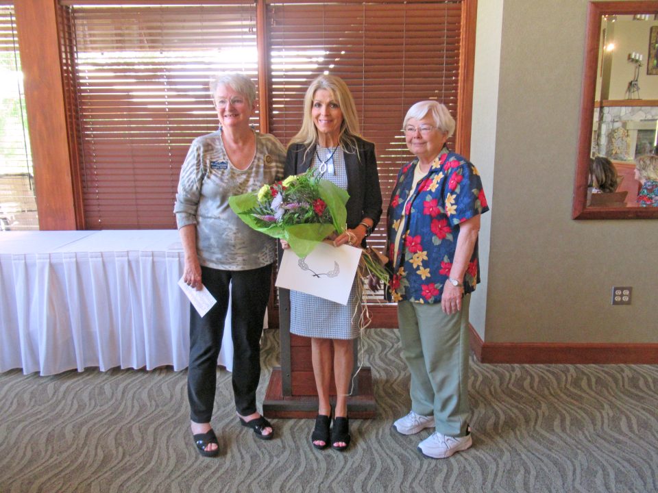 Stephanie Phillips (center) was presented the Ruby award by President Virgie Witte (left) and Sue Walker.