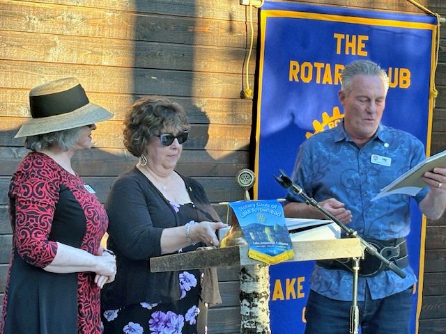 Adrianne, Lisa, Julia, Melissa and Adrianna from Glendora and Orange County enjoyed last year’s Brewfest at Tavern Bay Beach Club so much they couldn’t resist attending this year’s event. (Photos by Douglas W. Motley) Three people presenting at Rotary Club event.