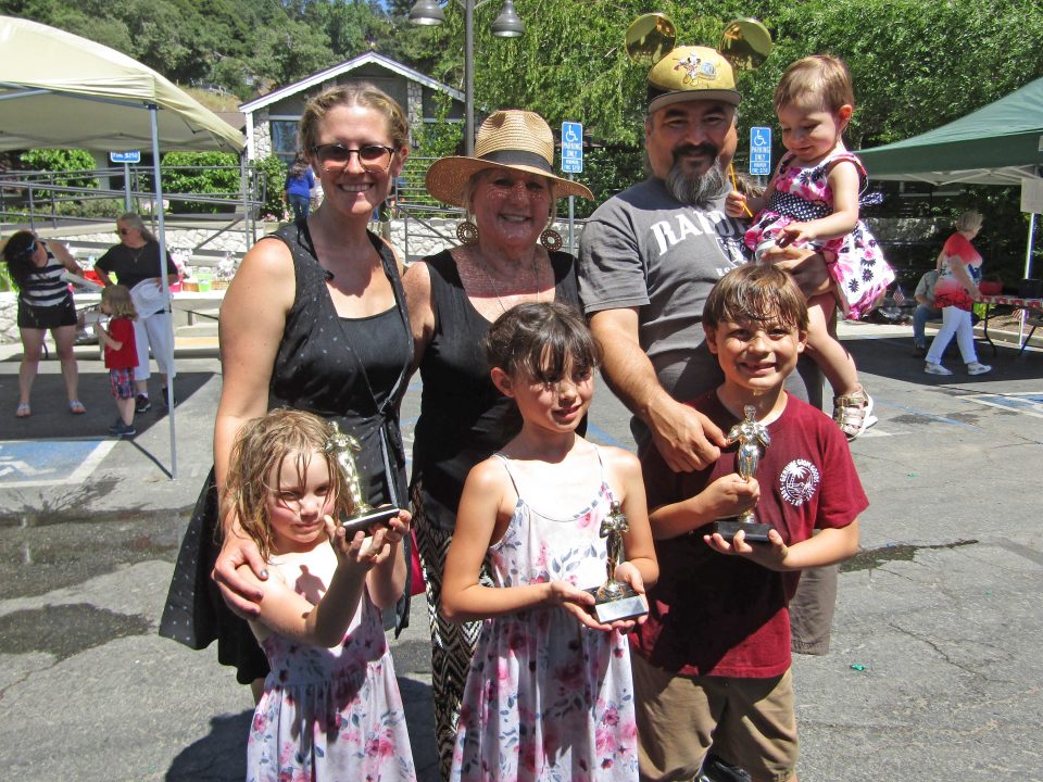 The Macias family with the trophies the family won at Grillin' and Chillin'.