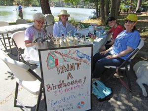 Sitting on the lake’s shore under the trees, bird houses were being painted by Sherell Watson, Virginia Paleno, Felicity Galpong and Vicki Matell during Grillin’ and Chillin’ last weekend.