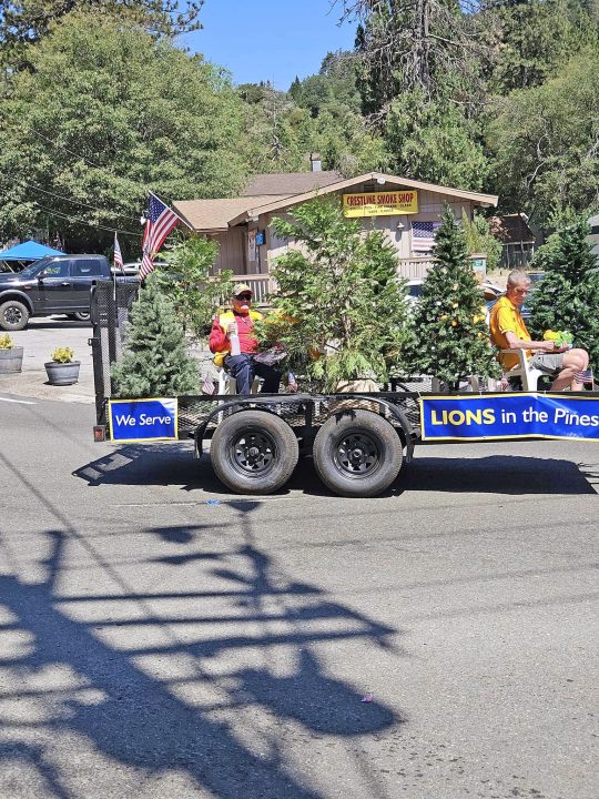 President Dann Lahr was at the helm of the Crestline Lions Club float.